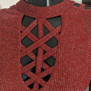 Red glittery cutout dress.